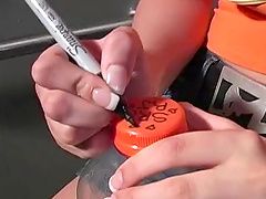 Blondie in pigtails licks and sucks a stranger's cock through a glory hole