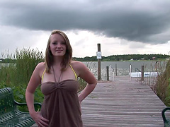 Darling solo model with big tits fingering her shaved pussy outdoors