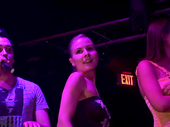 Sexy bitches on stage in a dancing contest at the club