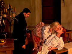 A blonde and a redhead share a horny man in a hardcore anal threesome