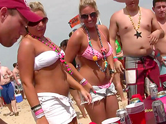 Desirous cowgirl show off curvy bodies in bikinis at outdoor party