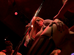 Shameless MILF in fishnet has hardcore group sex with clowns