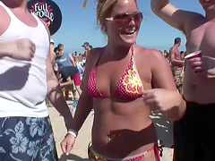 An outdoors beach party with pretty blondes in glasses