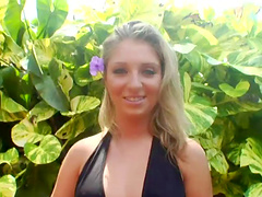 Naughty blonde wench in a bikini masturbating with a vibrator in a behind the scenes tape