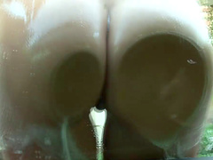 Lovely Latina babe with big tits licking ball outdoors in a close up shoot