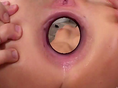 Lustful babe with long hair getting her anal smashed with a toy in  a close up shoot