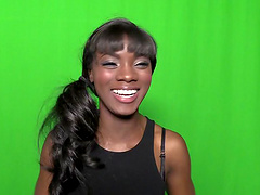 Ebony bitch Ana Foxxx shows her natural tits in backstage clip