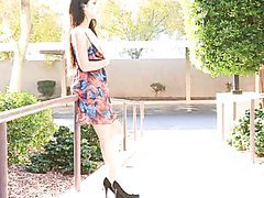 Shameless and sexy Lilly fingers her pussy in the street