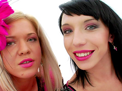 A couple of dirty dikes toy with each others asses using huge dildos
