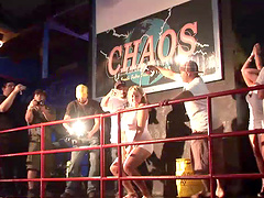 Sexy brunette with pretty natural tits dancing and having fun at a party