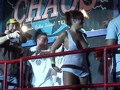 Sexy brunette with pretty natural tits dancing and having fun at a party