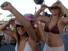 Attractive dame with natural tits in bikini getting wild in the party