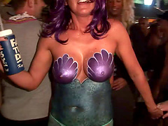 Lusty bitches with piercing show their natural tits in public