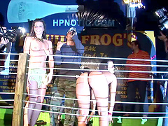 Sexy amateur brunette shows her tits in a club in reality vid