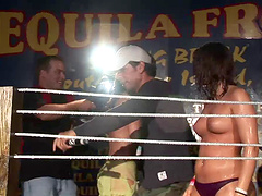 Sexy amateur brunette shows her tits in a club in reality vid