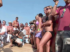 Slutty chicks in bikinis get naughty in public at a party