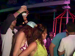 A few depraved amateur sluts flash their tits in a club