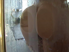 Lesbians Isabella and Jana Cova with fake tits enjoy fingering in shower