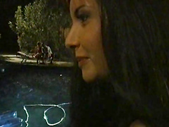 Lovely girls give blowjob before fucking themselves using strap on outdoor