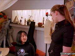 Leather-clad brunette with a hot body acting in a sexy movie