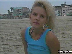 Blonde on the beach loves to take cock in this interracial sex scene