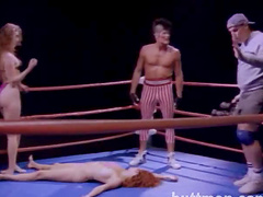 Sexy female wrestlers end up topless in the middle of the ring