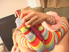 Sexy brunette in pigtails strips naked and toy fucks her juicy pussy