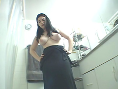 Busty brunette babe cages a horny guy and has her kiss her feet