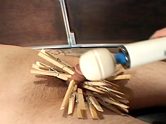 Beautiful dame busting her guys balls before working on his dick using toy in BDSM sex