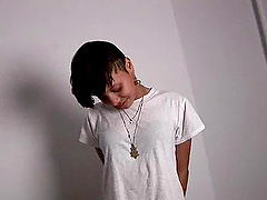 Slender solo model with natural tits  showing off her nice ass close up