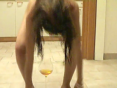 Radiant Latina brunette babe drinking piss out of a glass before giving a blowjob