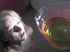 Stunning teen pornstar with natural tits enjoying a hot piss drinking session