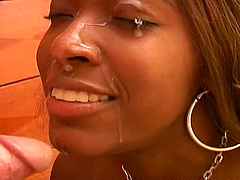 Charming ebony cowgirl getting her face fucked hardcore in a wild interracial shoot