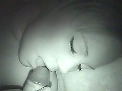 Cock sucking babe caught sleeping the night time cam