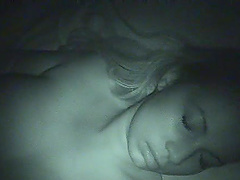 Amateur slut gets tits fondled while sleeping in bed