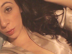 Brunette in reality porn fingering her cunt in masturbation