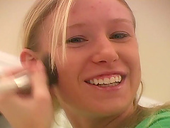 Sexy chick with nice big tits in bra while fixing her hair and makeup