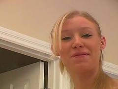 Sexy chick with nice big tits in bra while fixing her hair and makeup