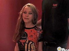 Teen with long hair masturbates on couch with vibrator