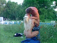 Sexy blonde nurse sucks dick and gets pussy banged on the grass