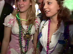Randy slut flashing her nice tits at the mardi gras party