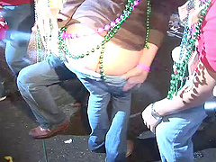 Randy slut flashing her nice tits at the mardi gras party