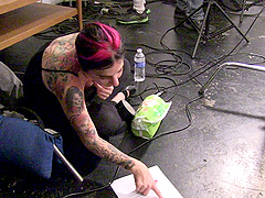 Tattooed porn babes in a behind the scenes video clip