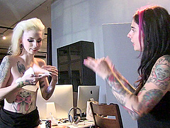Tattooed porn babes in a behind the scenes video clip
