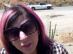 Sitting at a dusty rest stop Joanna Angel takes out her tits