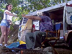 Couple enjoys outdoor sex in front of their trailer