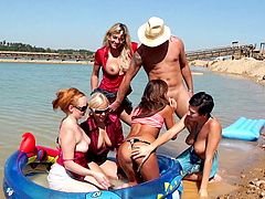 Outdoor group sex party on the beach with horny bitches