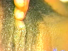Close up amateur video of ebony model playing with her hairy pussy