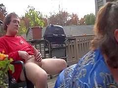 BBW mature sucks two large dicks in the back yard and loves it