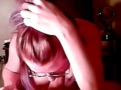 Amateur wife with glasses takes his whole dick in her mouth
